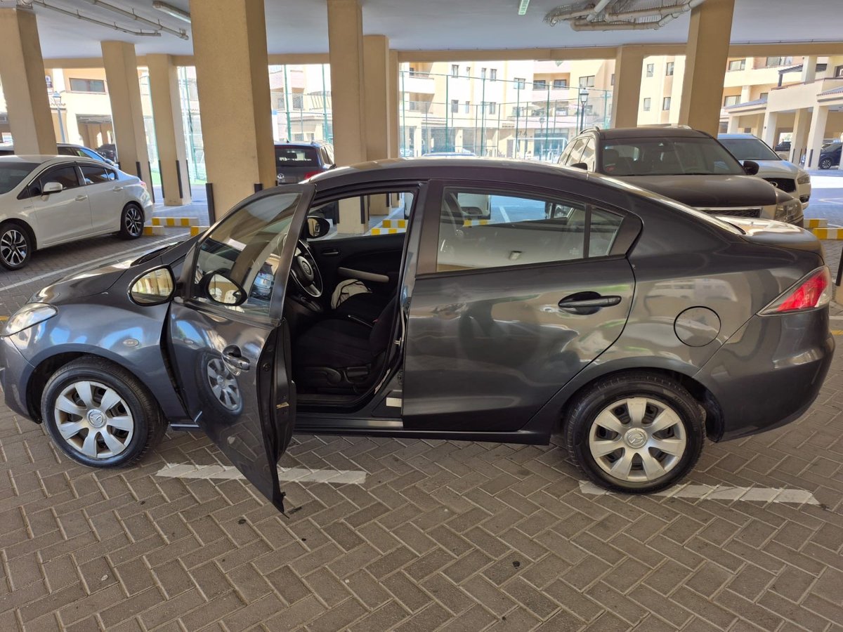 Mazda 2 Saloon car. Dark gray