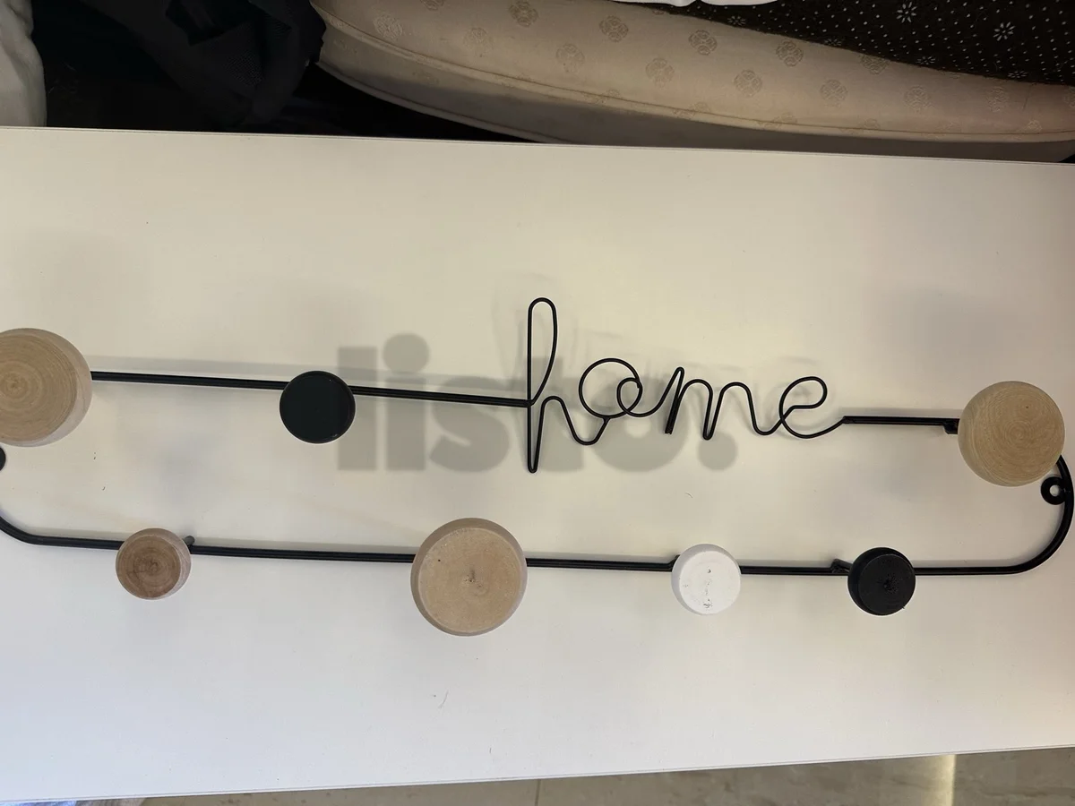 Peg wall mounted coat rack