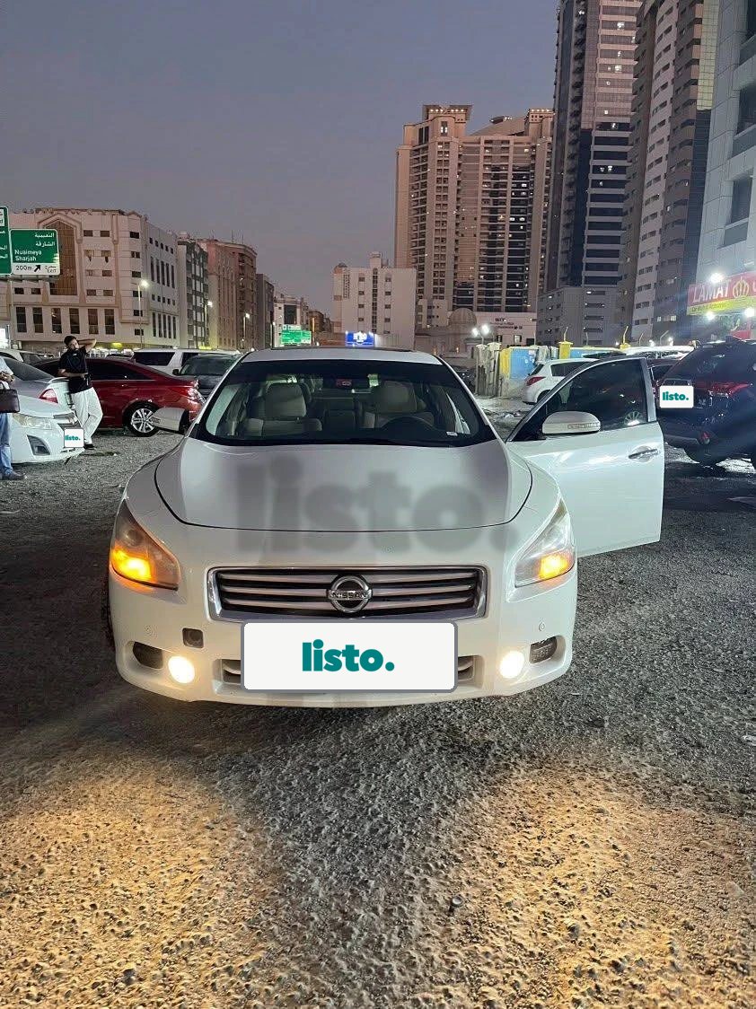 Nissan Maxima white sedan for sale - in excellent condition