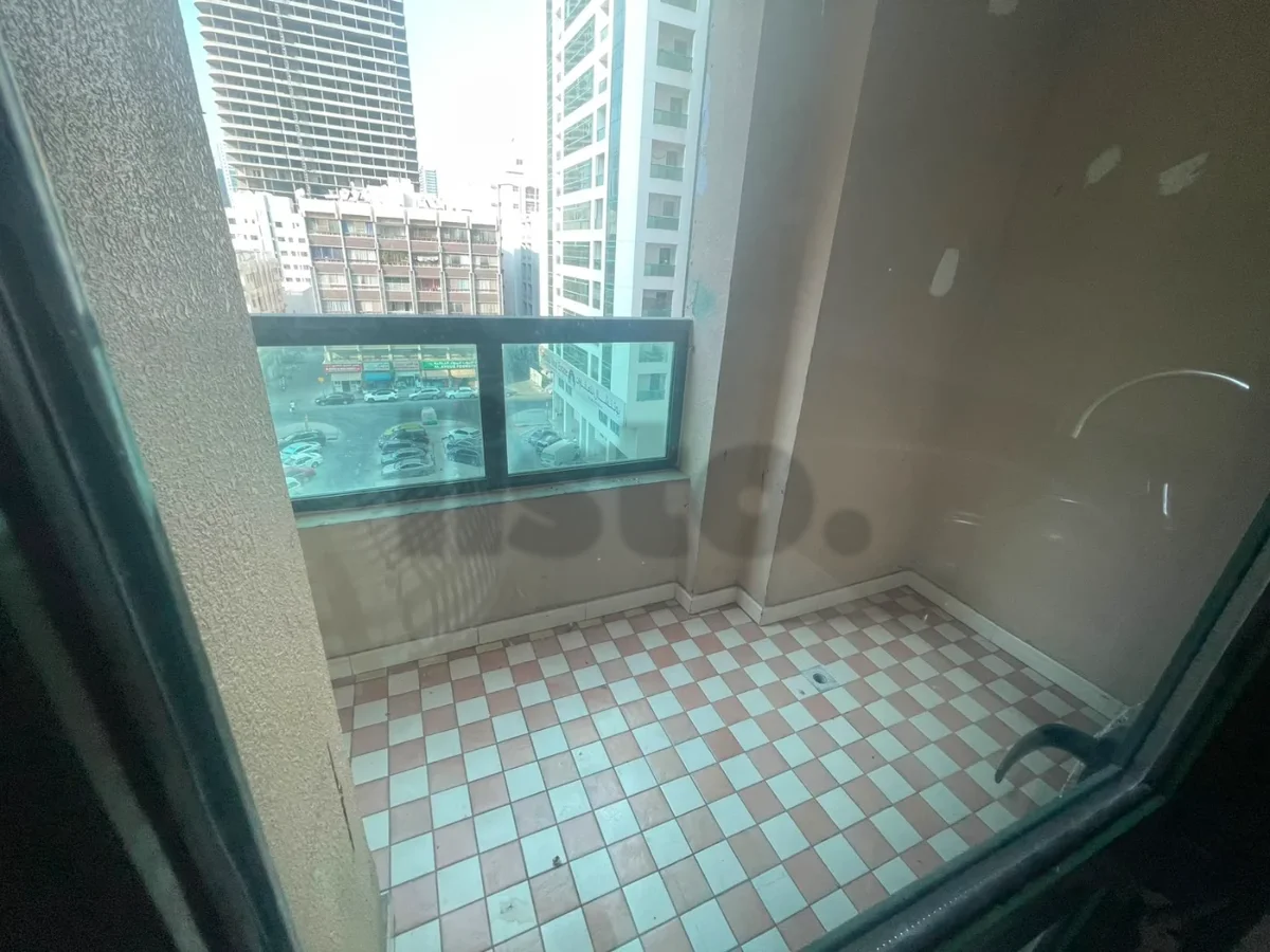 Apartment, three rooms and a hall, Al Majaz 2, balcony with a view, central air conditioning, wardrobes, free maintenance.