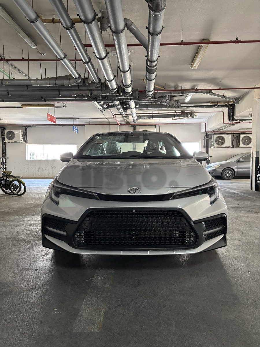 Toyota Corolla for Sale - Pristine Condition, White Sedan
