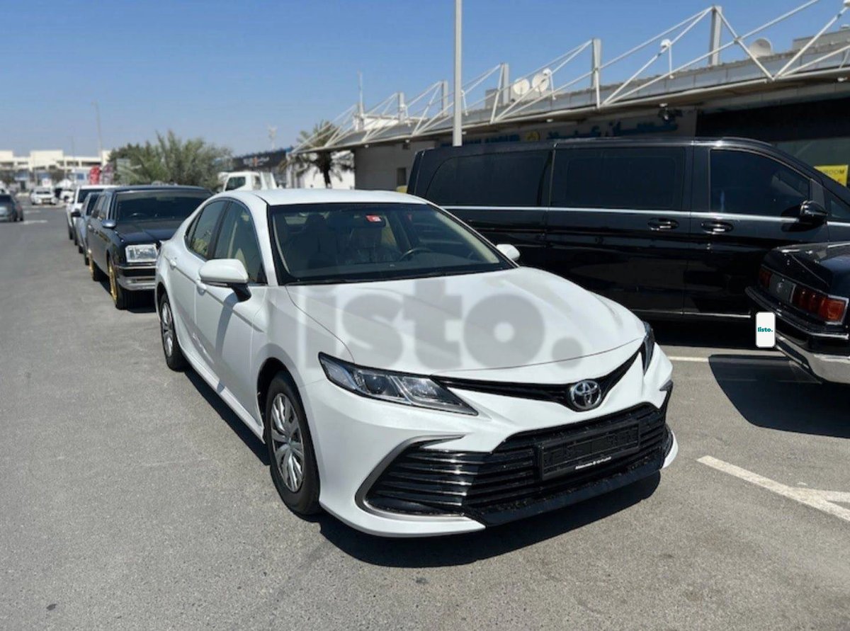 Pristine White Toyota Camry Sedan for Sale - Modern & Reliable