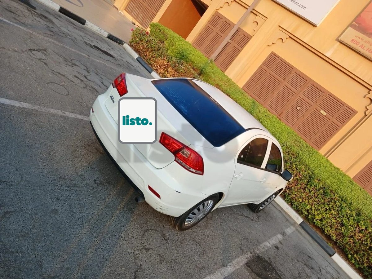 Mitsubishi Lancer for Sale - Clean Condition, White Sedan