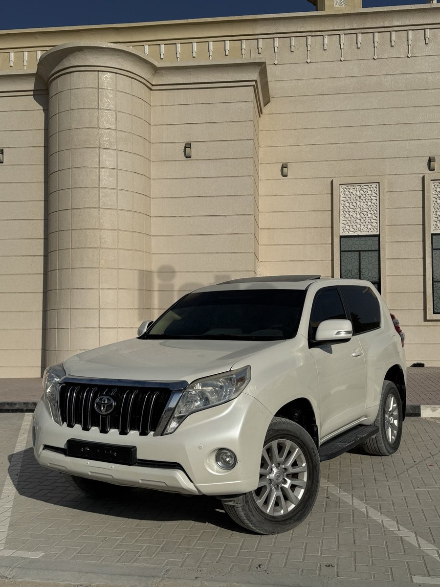 Toyota Land Cruiser Prado - White SUV, excellent condition