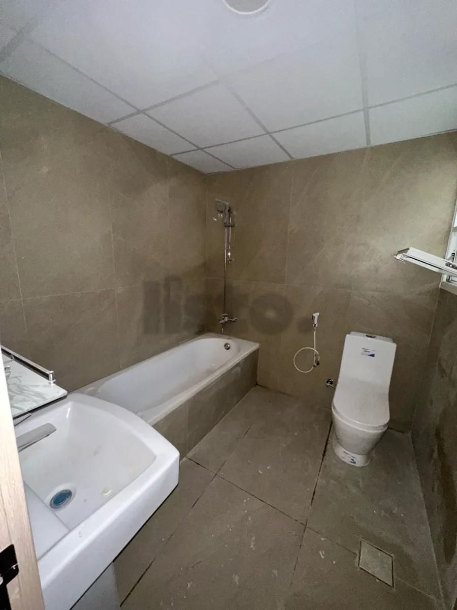 Three rooms and a hall, balcony, view, free maintenance, Al Majaz 2, Jamal Abdel Nasser St.